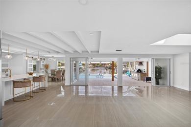 PUNTA GORDA ISLES! STUNNING MODERN 4 BEDROOM PLUS OFFICE, 3.5 on Saint Andrews South Golf Club in Florida - for sale on GolfHomes.com, golf home, golf lot