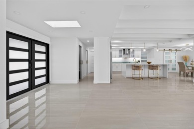 PUNTA GORDA ISLES! STUNNING MODERN 4 BEDROOM PLUS OFFICE, 3.5 on Saint Andrews South Golf Club in Florida - for sale on GolfHomes.com, golf home, golf lot