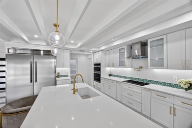 PUNTA GORDA ISLES! STUNNING MODERN 4 BEDROOM PLUS OFFICE, 3.5 on Saint Andrews South Golf Club in Florida - for sale on GolfHomes.com, golf home, golf lot