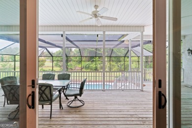 Nestled on a picturesque half-acre lot on the desirable Oak on Oak Grove Island Golf and Country Club in Georgia - for sale on GolfHomes.com, golf home, golf lot