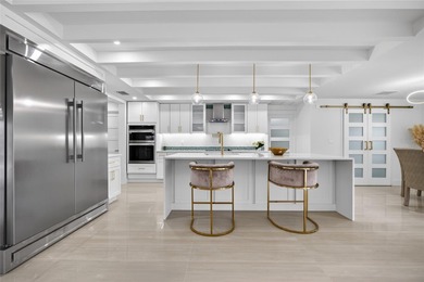 PUNTA GORDA ISLES! STUNNING MODERN 4 BEDROOM PLUS OFFICE, 3.5 on Saint Andrews South Golf Club in Florida - for sale on GolfHomes.com, golf home, golf lot