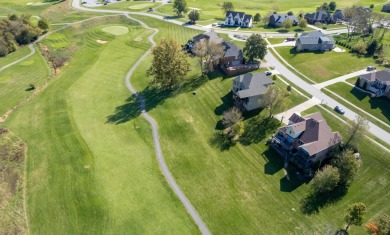 Experience luxury living in this stunning waterfront home on the on The Bull At Boones Trace in Kentucky - for sale on GolfHomes.com, golf home, golf lot