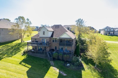 Experience luxury living in this stunning waterfront home on the on The Bull At Boones Trace in Kentucky - for sale on GolfHomes.com, golf home, golf lot