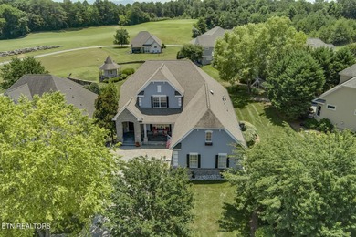 GOLF COURSE, POND and WATERFALL VIEWS from the back patio on Rarity Bay Country Club - Loudon in Tennessee - for sale on GolfHomes.com, golf home, golf lot