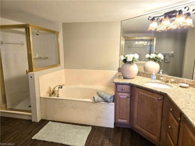 This beautifully appointed 3 bedroom, 2 bath second floor on Bonita Bay West in Florida - for sale on GolfHomes.com, golf home, golf lot
