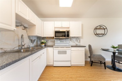 Discover the charm of this rarely available 2-bd 2.5-bath split on Hoakalei Country Club At Ocean Pointe in Hawaii - for sale on GolfHomes.com, golf home, golf lot