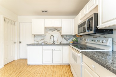 Discover the charm of this rarely available 2-bd 2.5-bath split on Hoakalei Country Club At Ocean Pointe in Hawaii - for sale on GolfHomes.com, golf home, golf lot