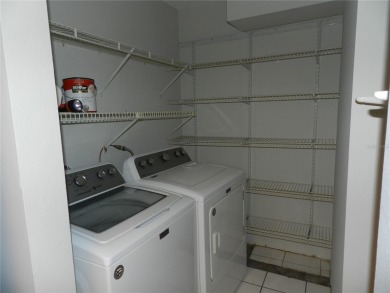 Freshly painted 2 bedroom, 2 bath ground floor end unit with1 on Innisbrook Resort and Golf Club in Florida - for sale on GolfHomes.com, golf home, golf lot