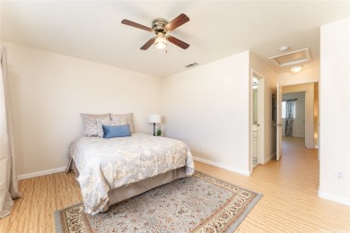 Discover the charm of this rarely available 2-bd 2.5-bath split on Hoakalei Country Club At Ocean Pointe in Hawaii - for sale on GolfHomes.com, golf home, golf lot