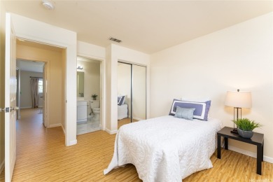 Discover the charm of this rarely available 2-bd 2.5-bath split on Hoakalei Country Club At Ocean Pointe in Hawaii - for sale on GolfHomes.com, golf home, golf lot