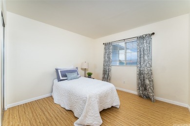 Discover the charm of this rarely available 2-bd 2.5-bath split on Hoakalei Country Club At Ocean Pointe in Hawaii - for sale on GolfHomes.com, golf home, golf lot