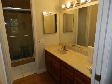 Freshly painted 2 bedroom, 2 bath ground floor end unit with1 on Innisbrook Resort and Golf Club in Florida - for sale on GolfHomes.com, golf home, golf lot