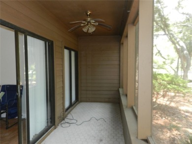 Freshly painted 2 bedroom, 2 bath ground floor end unit with1 on Innisbrook Resort and Golf Club in Florida - for sale on GolfHomes.com, golf home, golf lot
