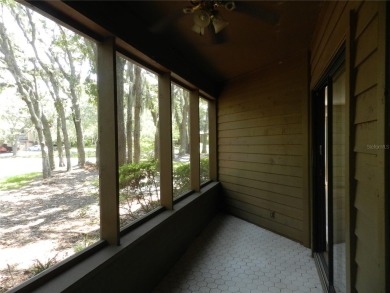 Freshly painted 2 bedroom, 2 bath ground floor end unit with1 on Innisbrook Resort and Golf Club in Florida - for sale on GolfHomes.com, golf home, golf lot