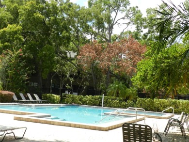 Freshly painted 2 bedroom, 2 bath ground floor end unit with1 on Innisbrook Resort and Golf Club in Florida - for sale on GolfHomes.com, golf home, golf lot