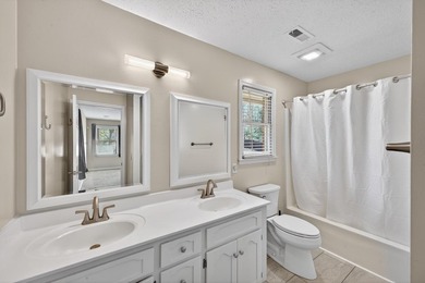 Nestled in the desirable Houndslake neighborhood, this inviting on Houndslake Country Club in South Carolina - for sale on GolfHomes.com, golf home, golf lot