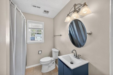 Nestled in the desirable Houndslake neighborhood, this inviting on Houndslake Country Club in South Carolina - for sale on GolfHomes.com, golf home, golf lot