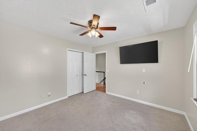 Nestled in the desirable Houndslake neighborhood, this inviting on Houndslake Country Club in South Carolina - for sale on GolfHomes.com, golf home, golf lot