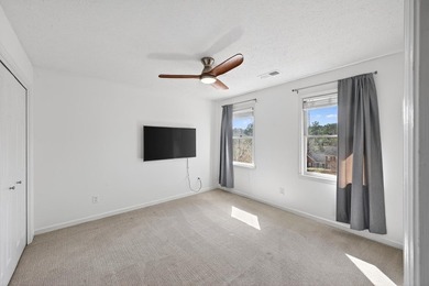 Nestled in the desirable Houndslake neighborhood, this inviting on Houndslake Country Club in South Carolina - for sale on GolfHomes.com, golf home, golf lot