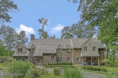 Magnificent stone manor house with guest home, inground pool and on Buck Hill Golf Club  in Pennsylvania - for sale on GolfHomes.com, golf home, golf lot