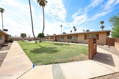 Welcome to this move-in-ready 2-bedroom, 2-bath end unit condo on Sun City Lakes West and East in Arizona - for sale on GolfHomes.com, golf home, golf lot
