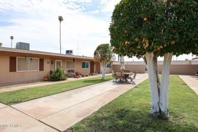 Welcome to this move-in-ready 2-bedroom, 2-bath end unit condo on Sun City Lakes West and East in Arizona - for sale on GolfHomes.com, golf home, golf lot