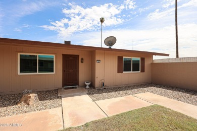 Welcome to this move-in-ready 2-bedroom, 2-bath end unit condo on Sun City Lakes West and East in Arizona - for sale on GolfHomes.com, golf home, golf lot