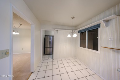 Welcome to this move-in-ready 2-bedroom, 2-bath end unit condo on Sun City Lakes West and East in Arizona - for sale on GolfHomes.com, golf home, golf lot