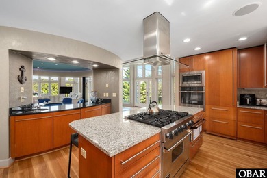 Bold in design and unmistakable in presence, this custom-built on The Currituck Golf Club in North Carolina - for sale on GolfHomes.com, golf home, golf lot