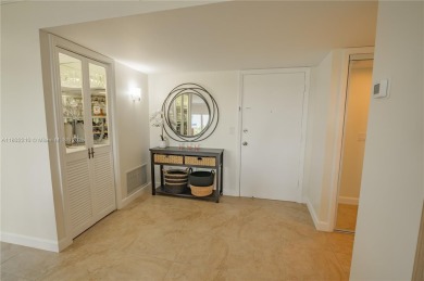 2 BEDS 2 BATHS TOTALLY RENOVATED AND FURNISHED HURRICANE IMPACT on The Diplomat Golf Resort and Spa in Florida - for sale on GolfHomes.com, golf home, golf lot