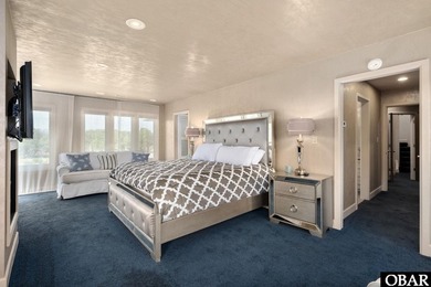 Bold in design and unmistakable in presence, this custom-built on The Currituck Golf Club in North Carolina - for sale on GolfHomes.com, golf home, golf lot