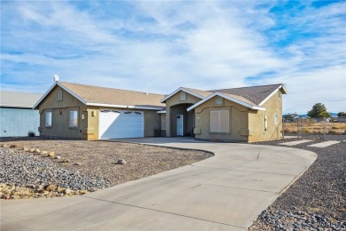 Explore this semi-custom home in the Valle Vista community on Valle Vista Golf Course in Arizona - for sale on GolfHomes.com, golf home, golf lot