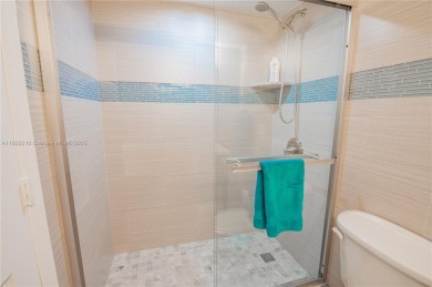 2 BEDS 2 BATHS TOTALLY RENOVATED AND FURNISHED HURRICANE IMPACT on The Diplomat Golf Resort and Spa in Florida - for sale on GolfHomes.com, golf home, golf lot