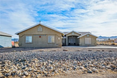 Explore this semi-custom home in the Valle Vista community on Valle Vista Golf Course in Arizona - for sale on GolfHomes.com, golf home, golf lot