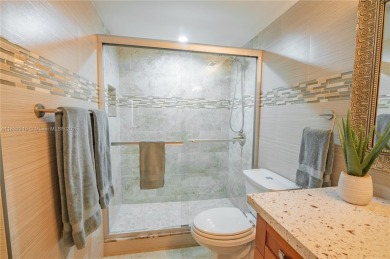 2 BEDS 2 BATHS TOTALLY RENOVATED AND FURNISHED HURRICANE IMPACT on The Diplomat Golf Resort and Spa in Florida - for sale on GolfHomes.com, golf home, golf lot