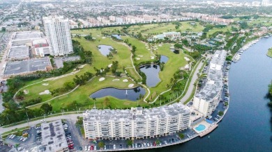 2 BEDS 2 BATHS TOTALLY RENOVATED AND FURNISHED HURRICANE IMPACT on The Diplomat Golf Resort and Spa in Florida - for sale on GolfHomes.com, golf home, golf lot