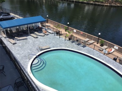 2 BEDS 2 BATHS TOTALLY RENOVATED AND FURNISHED HURRICANE IMPACT on The Diplomat Golf Resort and Spa in Florida - for sale on GolfHomes.com, golf home, golf lot