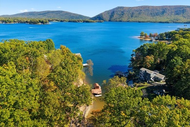 Million-dollar views of Smith Mountain and the lake from this on Mariners Landing Golf and Country Club in Virginia - for sale on GolfHomes.com, golf home, golf lot