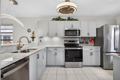 FURNISHED! TOP FLOOR UPDATED 2 BEDROOM, 2 BATH CONDO IN THE on Kingsway Country Club in Florida - for sale on GolfHomes.com, golf home, golf lot