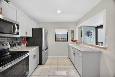 FURNISHED! TOP FLOOR UPDATED 2 BEDROOM, 2 BATH CONDO IN THE on Kingsway Country Club in Florida - for sale on GolfHomes.com, golf home, golf lot