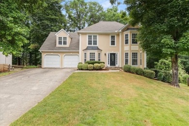 Tucked at the end of a quiet cul-de-sac and backing up to on Canongate At Eagle Watch Golf Club in Georgia - for sale on GolfHomes.com, golf home, golf lot