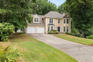 Tucked at the end of a quiet cul-de-sac and backing up to on Canongate At Eagle Watch Golf Club in Georgia - for sale on GolfHomes.com, golf home, golf lot