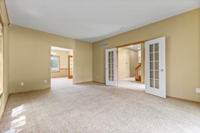 Enjoy golf course living in this spacious 4-bed, 3.5-bath on Ankeny Golf and Country Club in Iowa - for sale on GolfHomes.com, golf home, golf lot