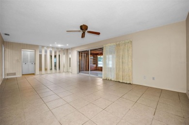 See this stately 4-bedroom, 3-bath home in the highly on The Dunedin Country Club in Florida - for sale on GolfHomes.com, golf home, golf lot