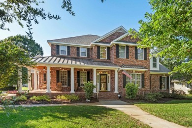 This beautiful all-brick traditional home is situated on a on The Dunes Golf and Beach Club in South Carolina - for sale on GolfHomes.com, golf home, golf lot