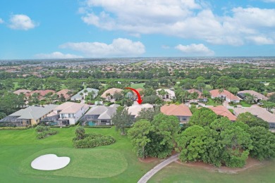 STUNNING POOL HOME WITH SWEEPING GOLF COURSE VIEW IN PGA on PGA Golf Club in PGA Village in Florida - for sale on GolfHomes.com, golf home, golf lot