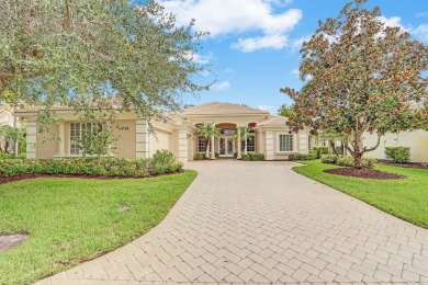 STUNNING POOL HOME WITH SWEEPING GOLF COURSE VIEW IN PGA on PGA Golf Club in PGA Village in Florida - for sale on GolfHomes.com, golf home, golf lot