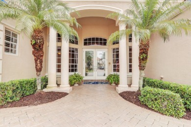 STUNNING POOL HOME WITH SWEEPING GOLF COURSE VIEW IN PGA on PGA Golf Club in PGA Village in Florida - for sale on GolfHomes.com, golf home, golf lot