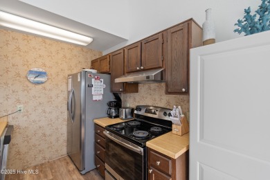 Package sale -- 51 Wilmington St. (single-family) with adjoining on Sea Trail Golf Resort in North Carolina - for sale on GolfHomes.com, golf home, golf lot