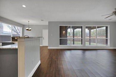 This inviting two-story home offers a practical and comfortable on The Trails of Frisco Golf Club in Texas - for sale on GolfHomes.com, golf home, golf lot